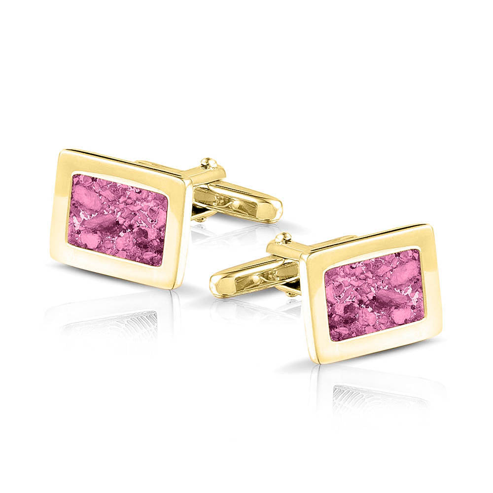 Manchetknopen met as, zichtbaar gevuld, als herinneringssieraad. fluo