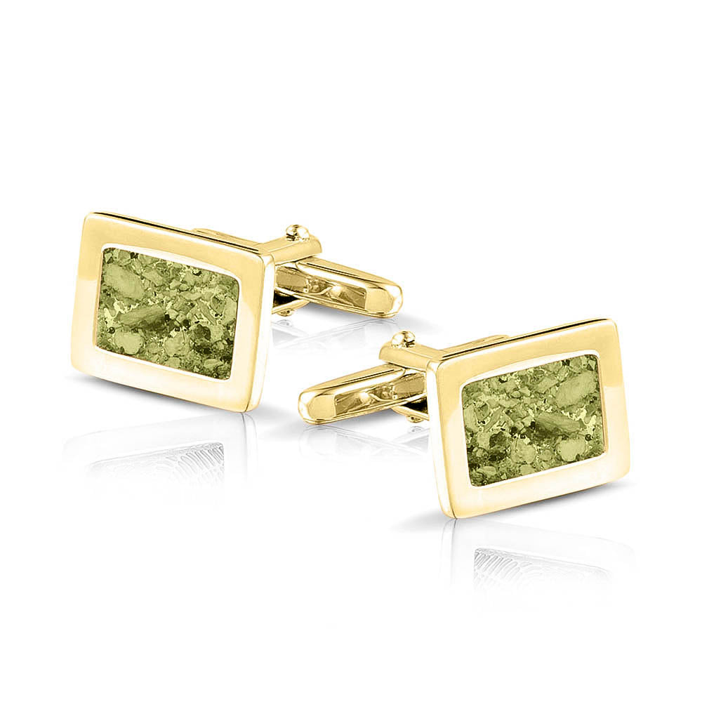 Manchetknopen met as, zichtbaar gevuld, als herinneringssieraad. olive