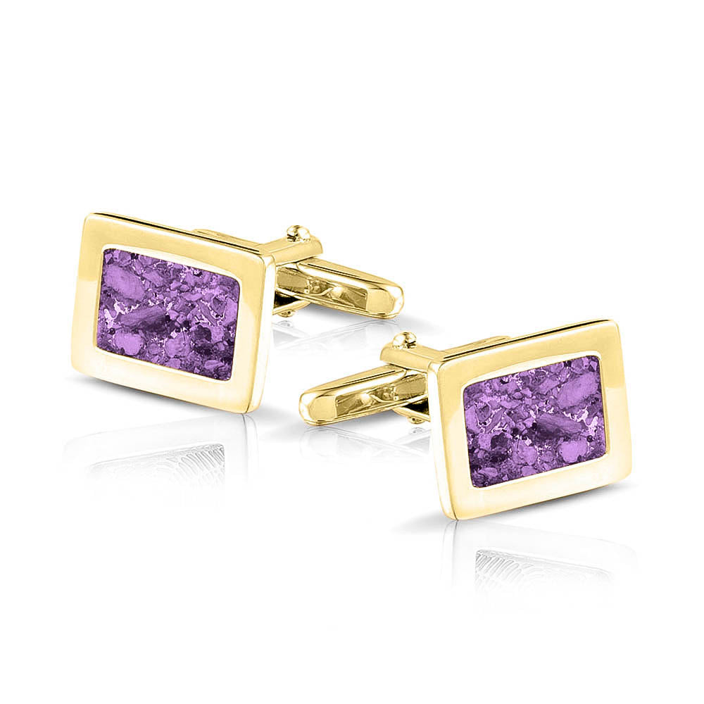 Manchetknopen met as, zichtbaar gevuld, als herinneringssieraad. purple