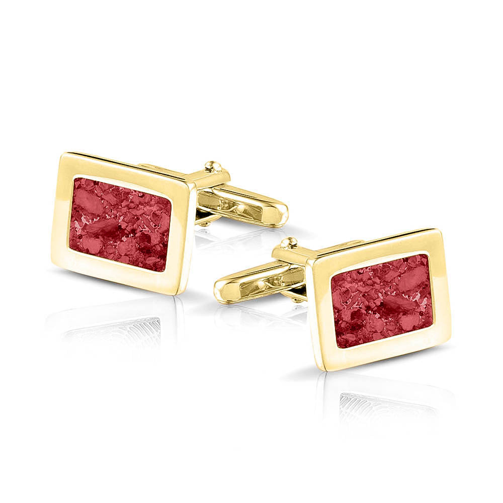 Manchetknopen met as, zichtbaar gevuld, als herinneringssieraad. red