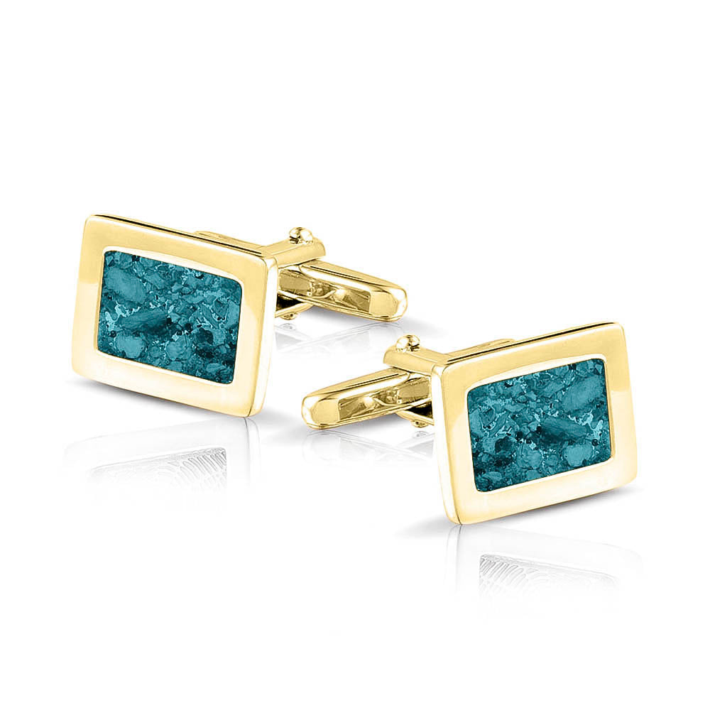 Manchetknopen met as, zichtbaar gevuld, als herinneringssieraad. turquoise
