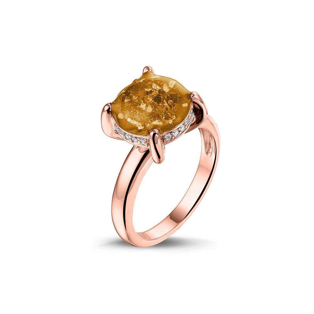 Gedenksieraad, asring 3 mm waar aan de bovenzijde zichtbaar as of haar verwerkt wordt, rondom aan de zijkant gezet met zirkonia's of diamanten naar keuze. Gold