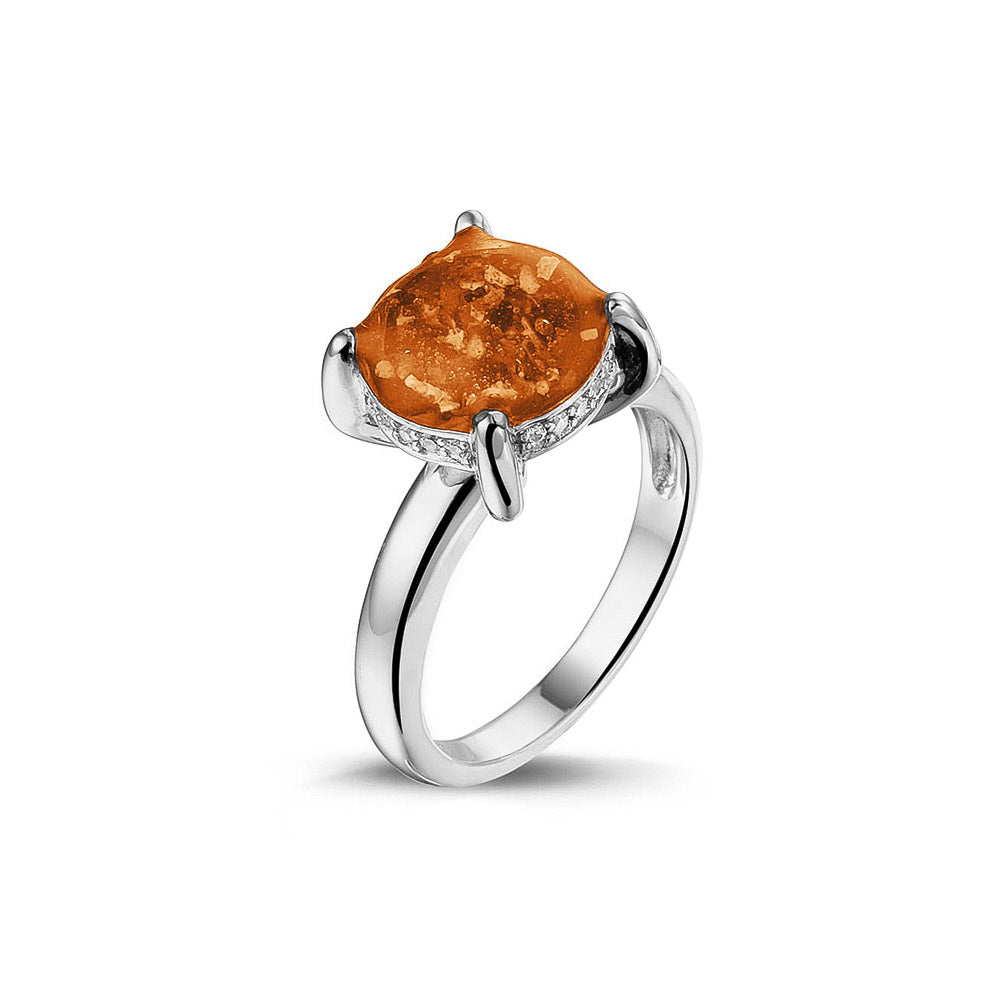 Gedenksieraad, asring 3 mm waar aan de bovenzijde zichtbaar as of haar verwerkt wordt, rondom aan de zijkant gezet met zirkonia's of diamanten naar keuze. Orange