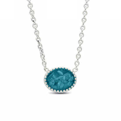 Ashanger, gedenksieraad, waar as en haar in verwerkt wordt. turquoise