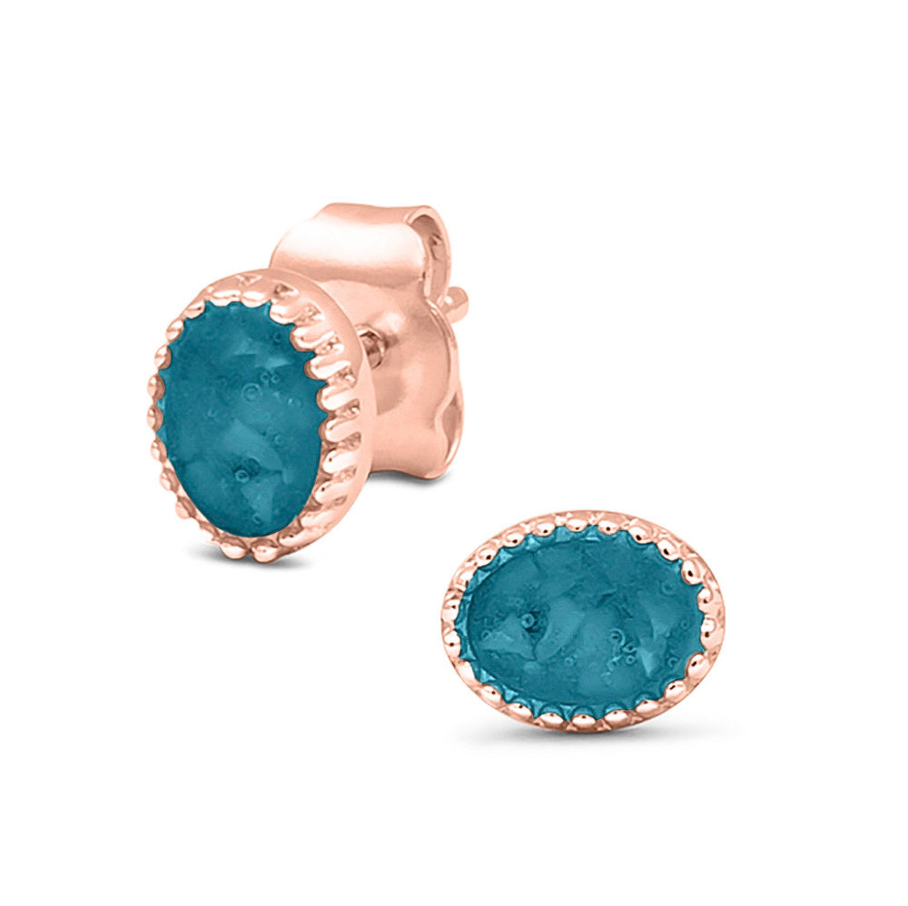 Ovaal gevormde oorstekers, aan de voorzijde zichtbaar gevuld met as of haar. Turquoise