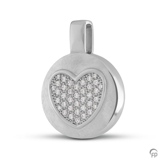Ronde hanger met in het midden een hartje, in zilver uitgevoerd met zirkonia's, in goud met diamanten.  De ashangers uit deze collectie gedenksieraden zijn eenvoudig zelf te vullen