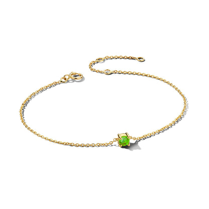 Exclusieve 14 KT geelgouden anker armband met geboortesteen in chatonzetting.