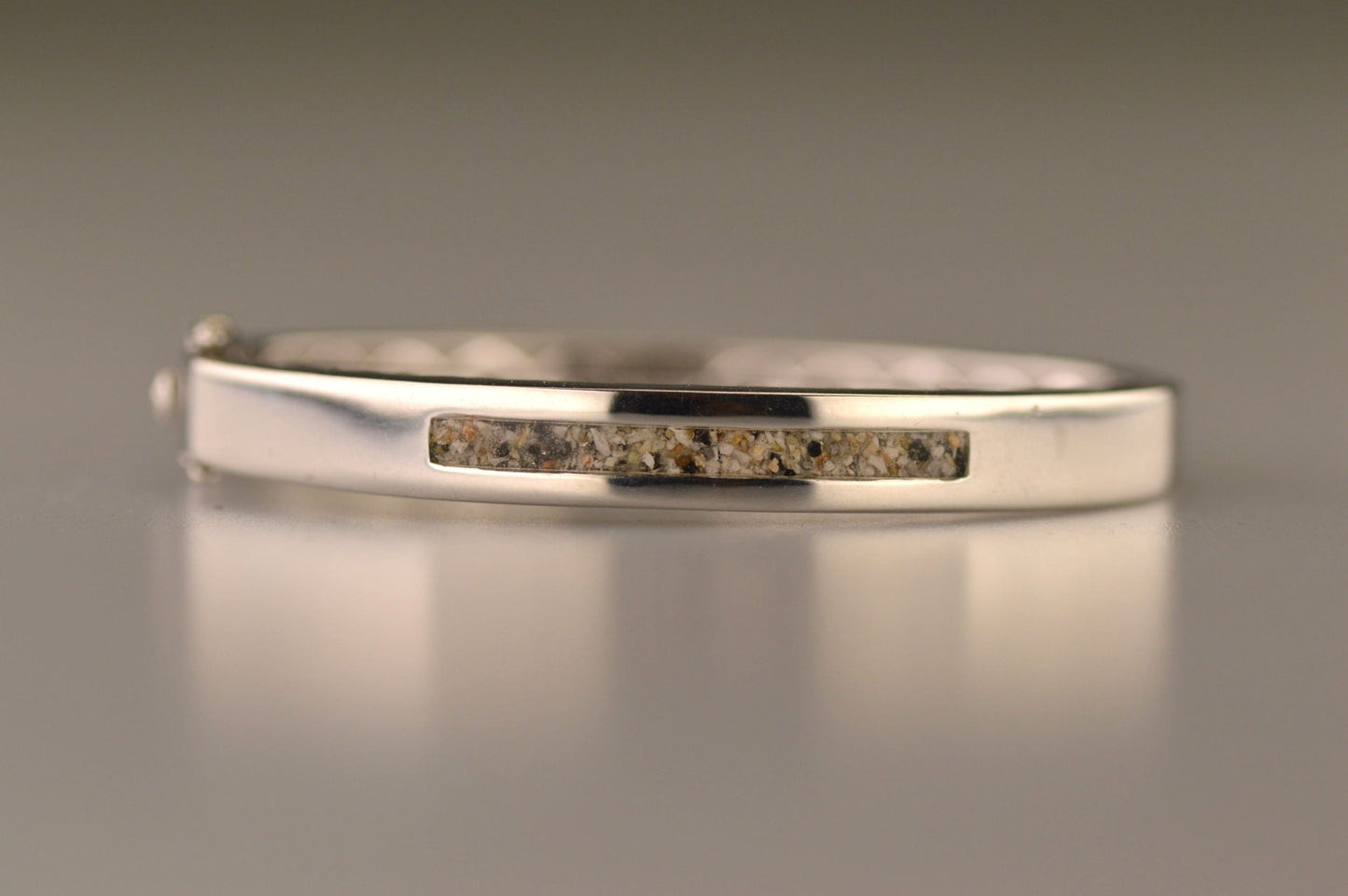 Roségouden as armband die  gevuld kan worden met as of haar