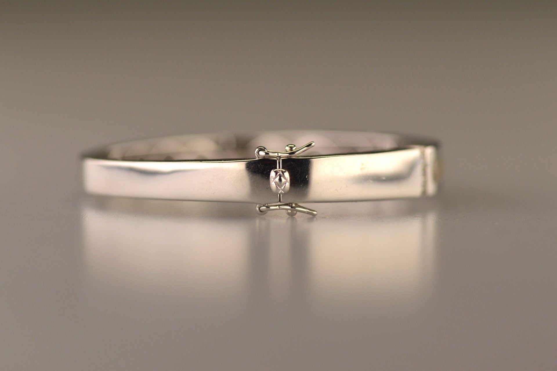 Roségouden as armband die gevuld kan worden met as of haar 