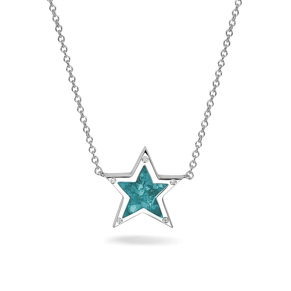 Ashanger ster, gedenksieraad, waar as en haar in verwerkt wordt. Aqua
