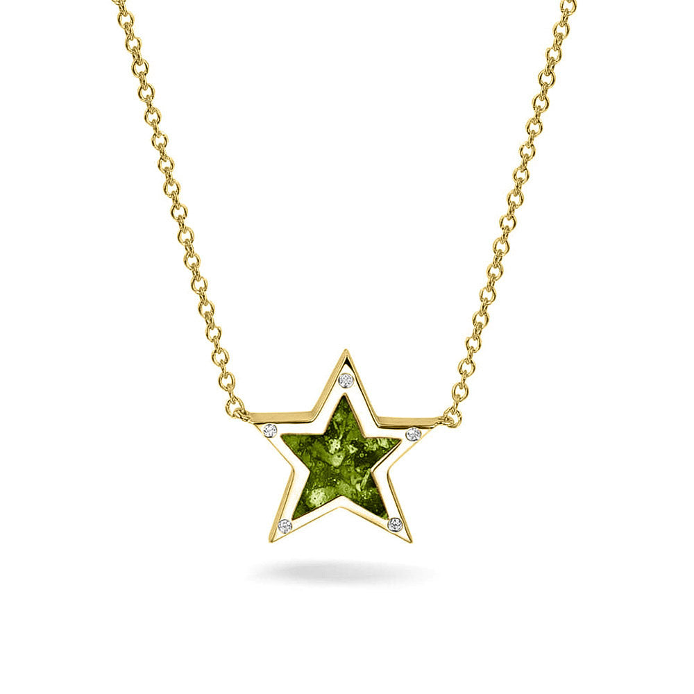 Ashanger ster, gedenksieraad, waar as en haar in verwerkt wordt. Green