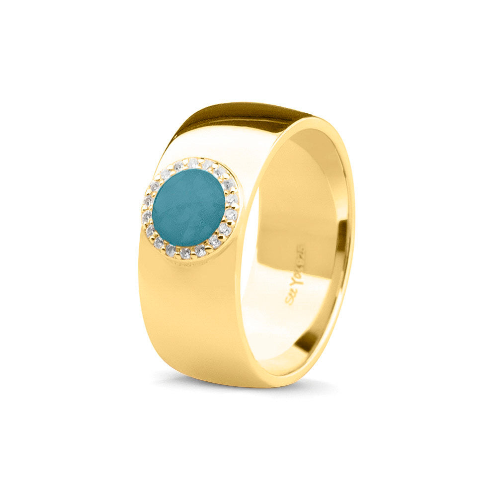 Gladde ring 8 mm uit onze serie gedenksieraden, waar aan de bovenzijde zichtbaar as of haar verwerkt wordt in een rondje, rondom gezet met zirkonia's of diamanten naar keuze. Turquoise