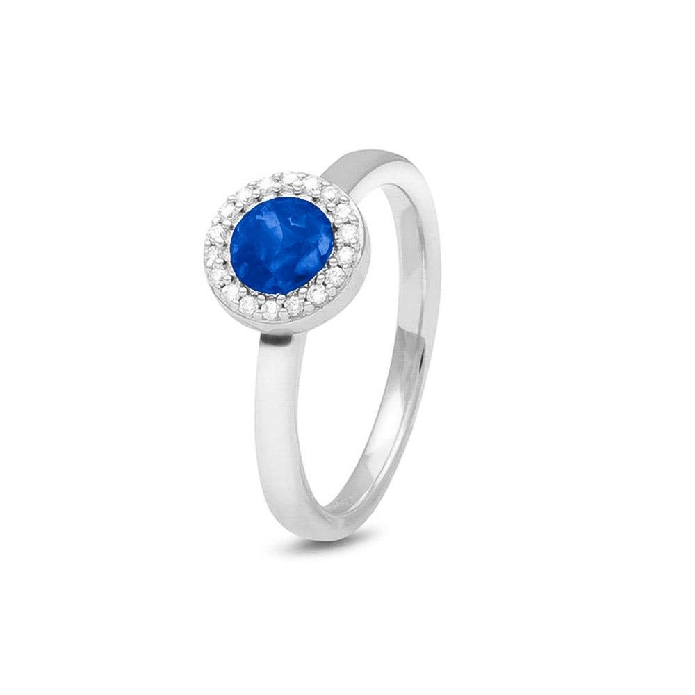  Gedenksieraad, ring 2.5 mm breed met edelstenen naar keuze rondom het compartiment  waar zichtbaar as of haar  in verwerkt wordt. Blue