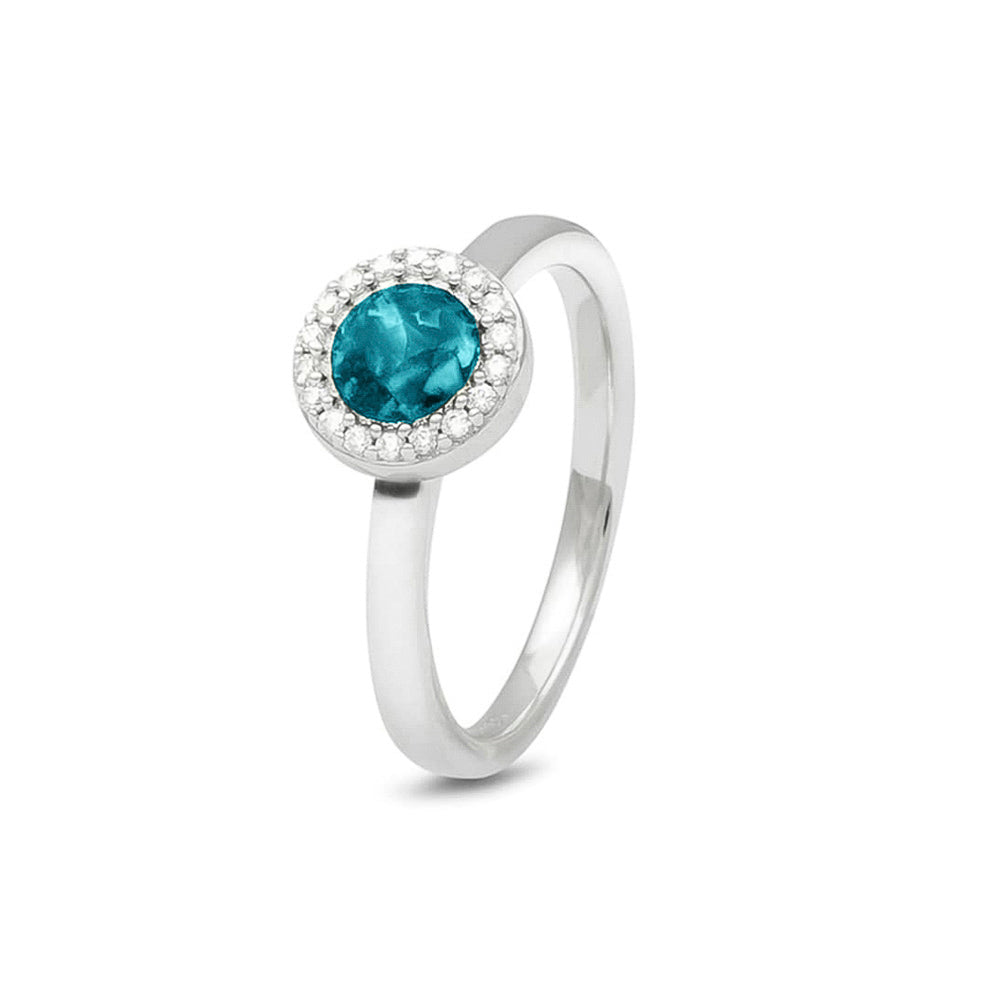  Gedenksieraad, ring 2.5 mm breed met edelstenen naar keuze rondom het compartiment  waar zichtbaar as of haar  in verwerkt wordt. Turquoise