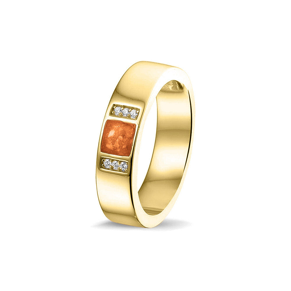 Ring uit onze serie gedenksieraden, waar zichtbaar as of haar verwerkt wordt in twee separate compartimenten geflankeerd door zes stuks zirkonia's of diamanten naar keuze. Orange
